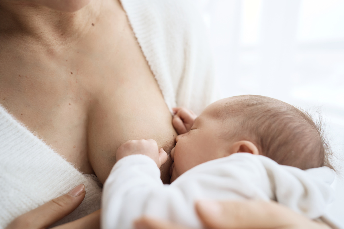 Mother Breastfeeding Newborn Baby 